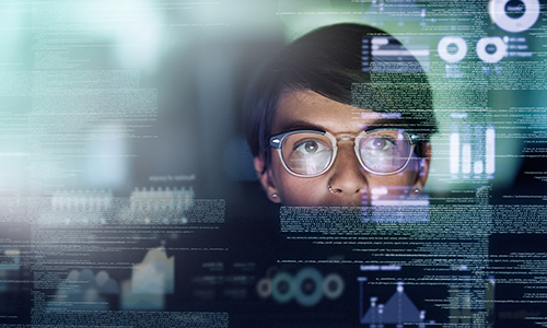 Man staring at screen with analytics