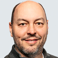 Presenter John McElroy