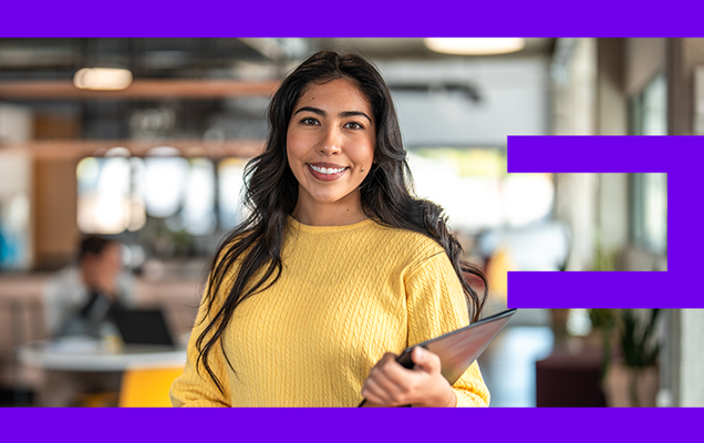 Educator and students at table with laptop