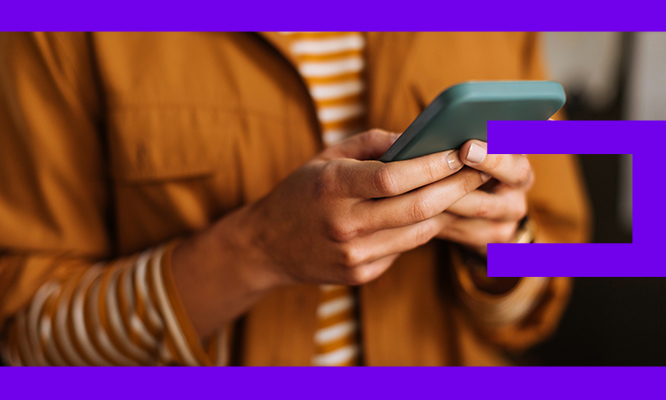 Educator and students at table with laptop